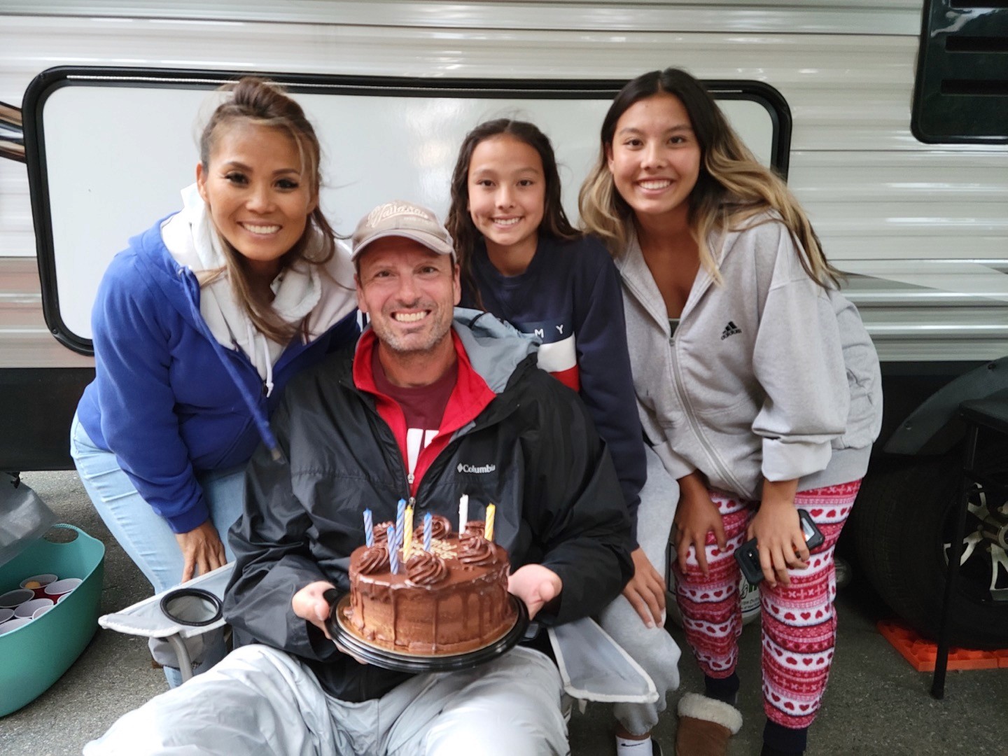 a large building with a dome on top of it surrounded by trees