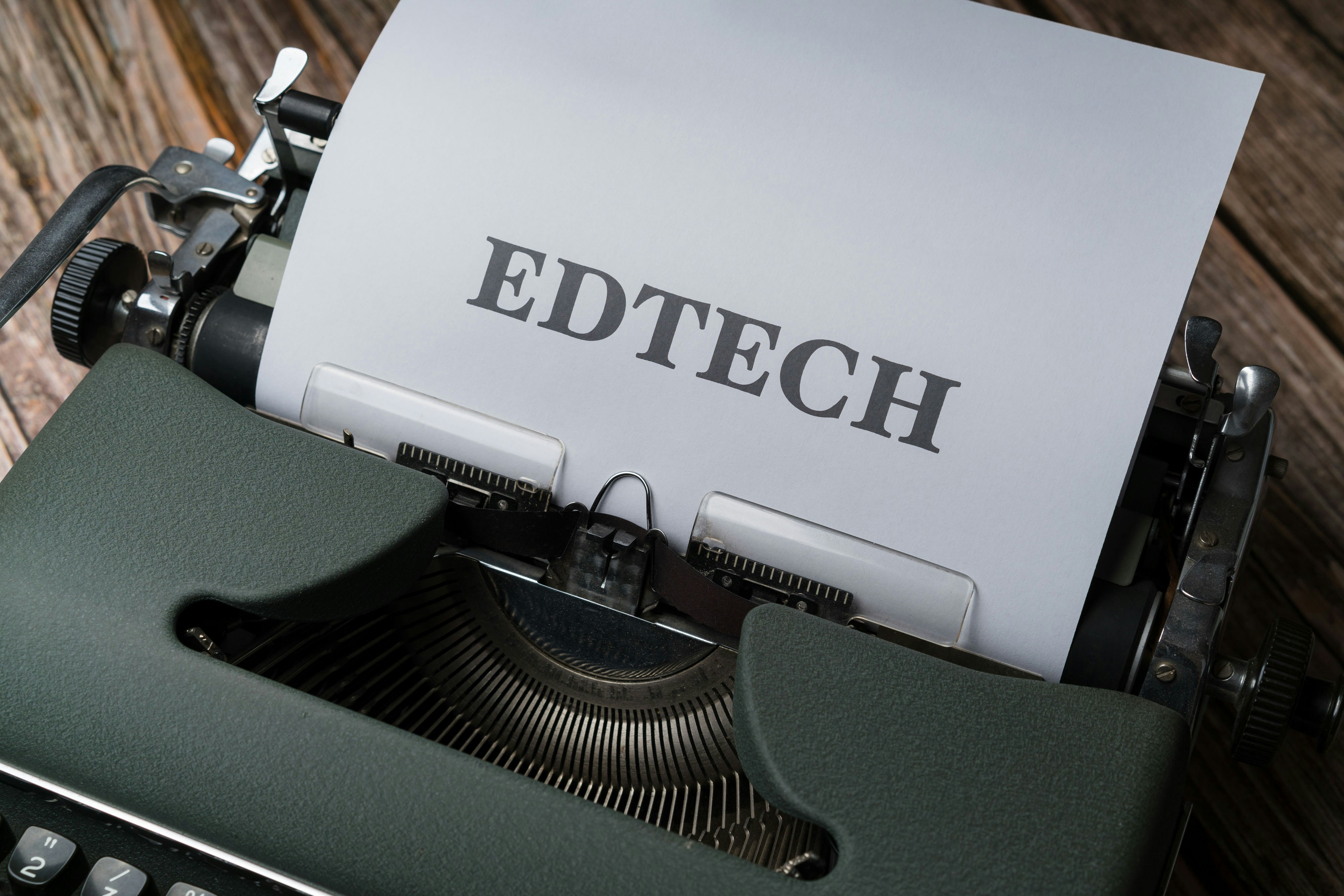a close up of a typewriter with a piece of paper on it