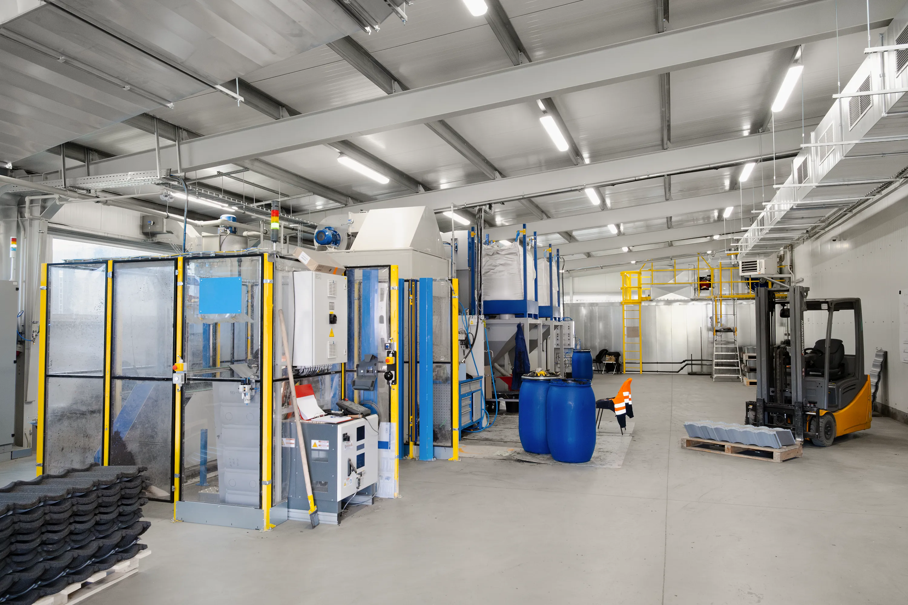 Metal roof tiles wet coating line – robotic hanging station