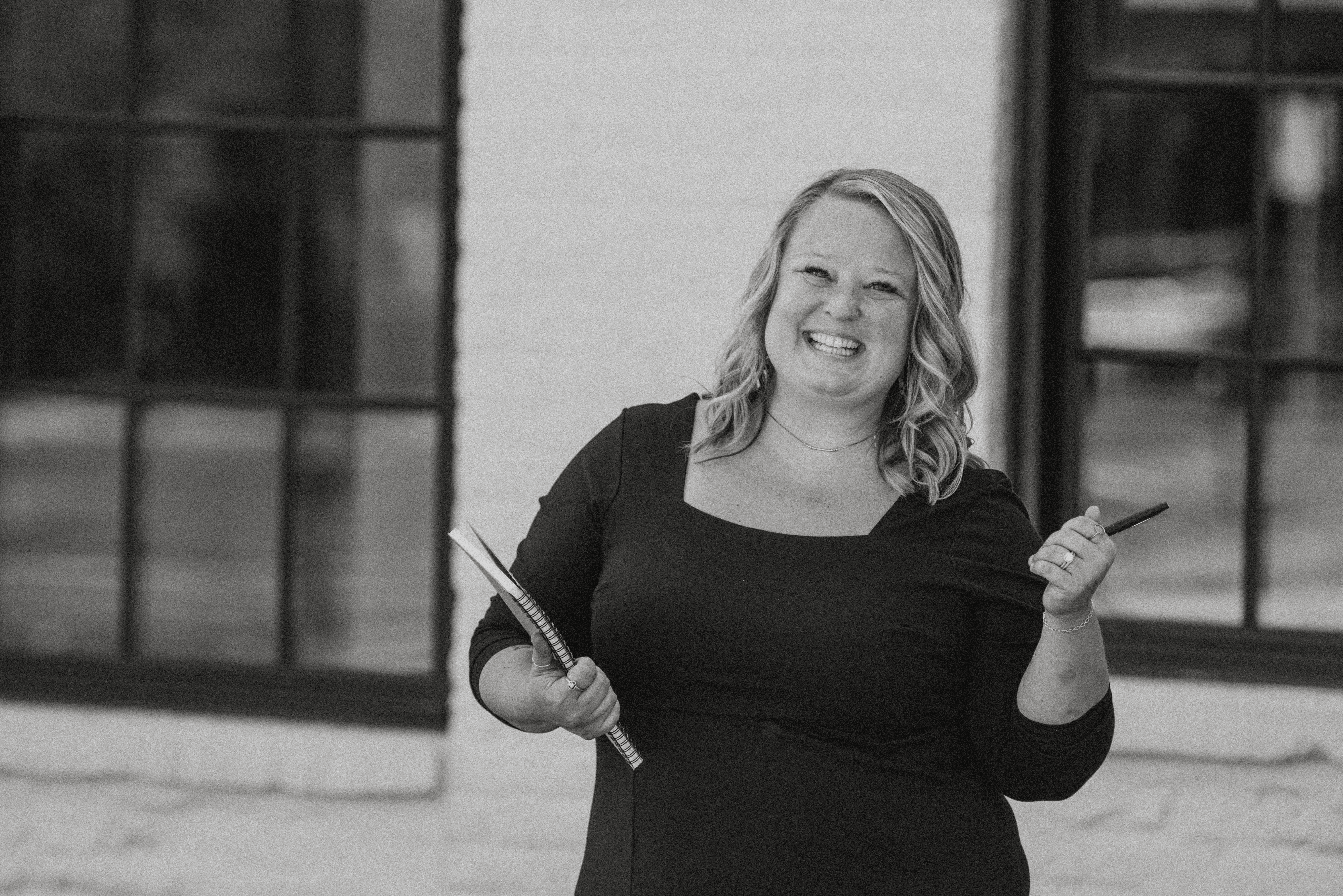 A mother and her daughter are working together on a laptop, focusing on homework