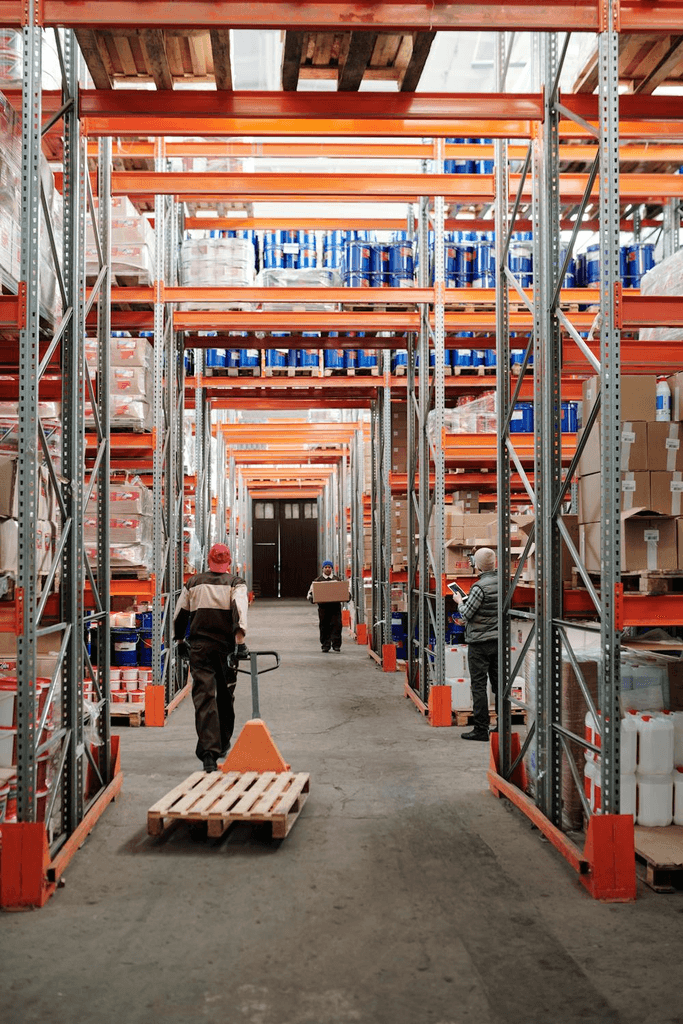 a warehouse worker moving handjack