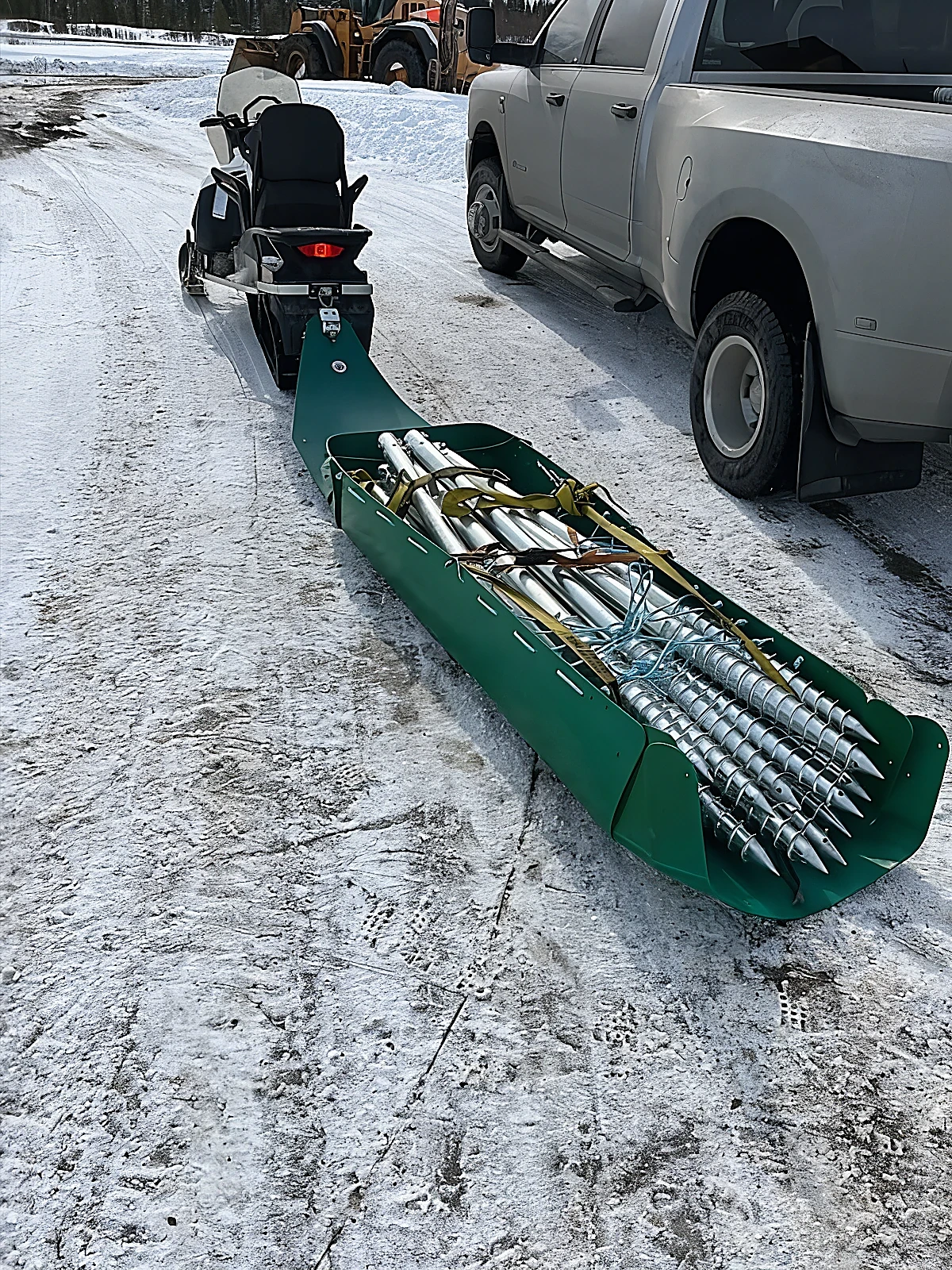 Snowmachine and ground screws in Alaska