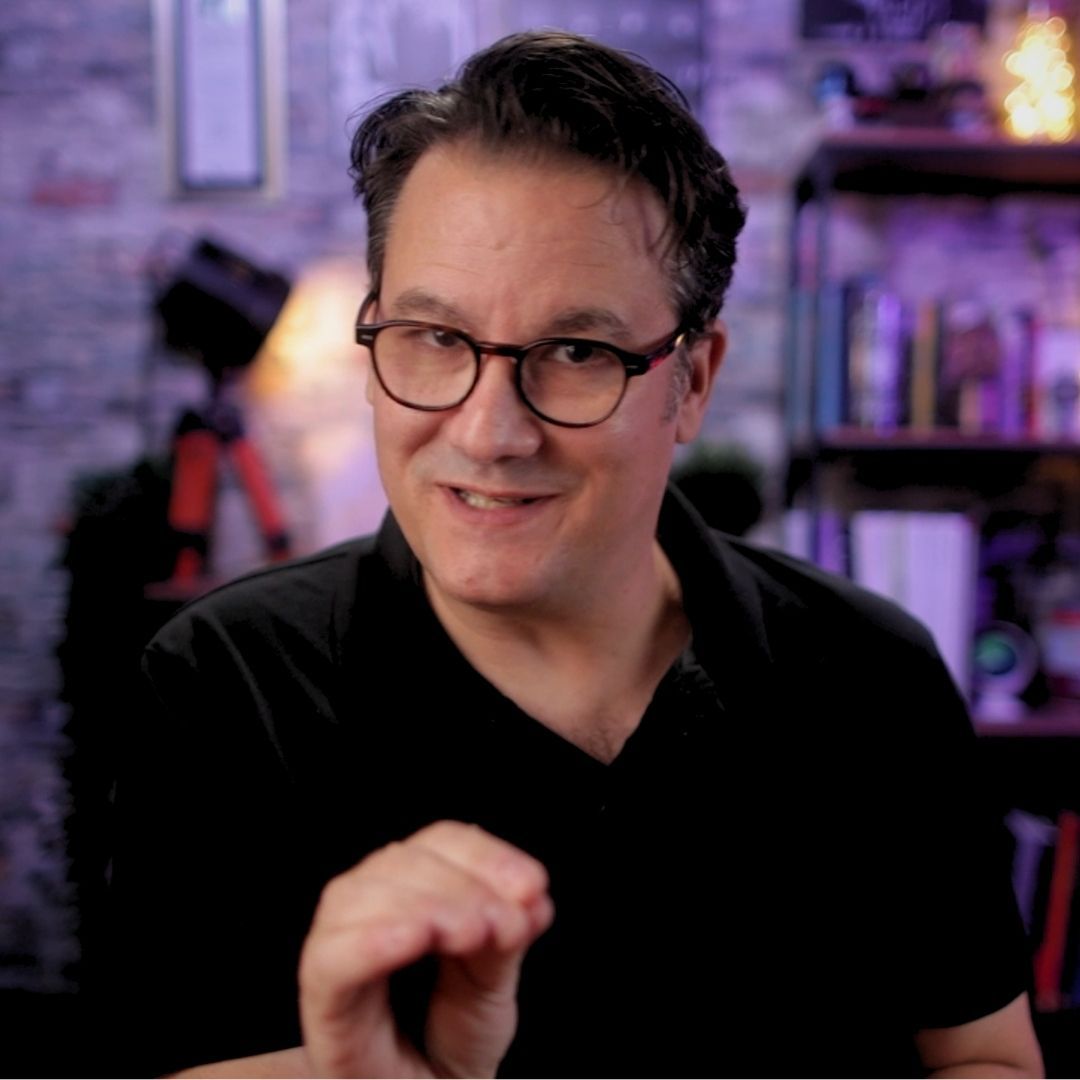 Screenwriter James A Hurst making a point in his studio