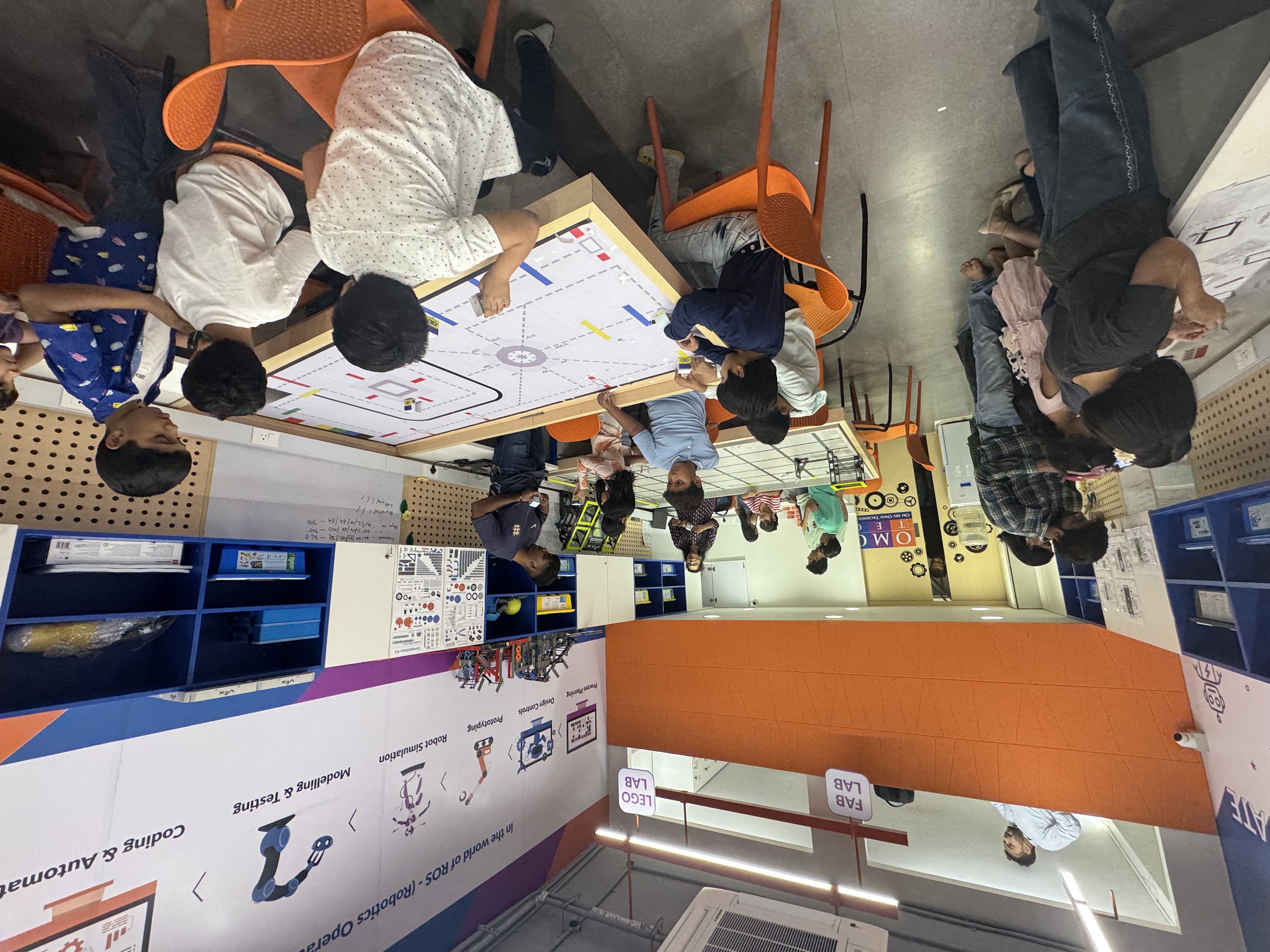 brown wooden lounger near body of water