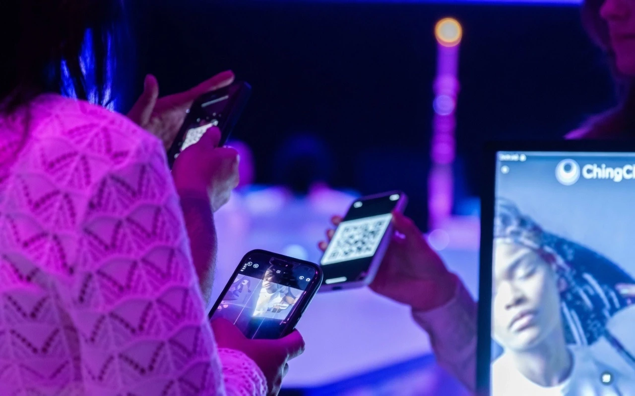 Youth filming live content at a Ching Ching event