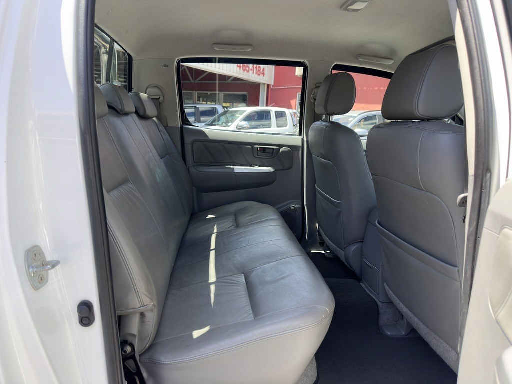man in white crew neck shirt wearing black framed eyeglasses