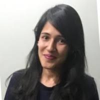 woman in white and blue checked dress shirt