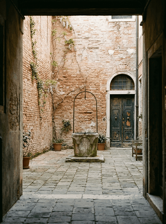 quiet Venetian courtyard with stone well, hidden space Venice