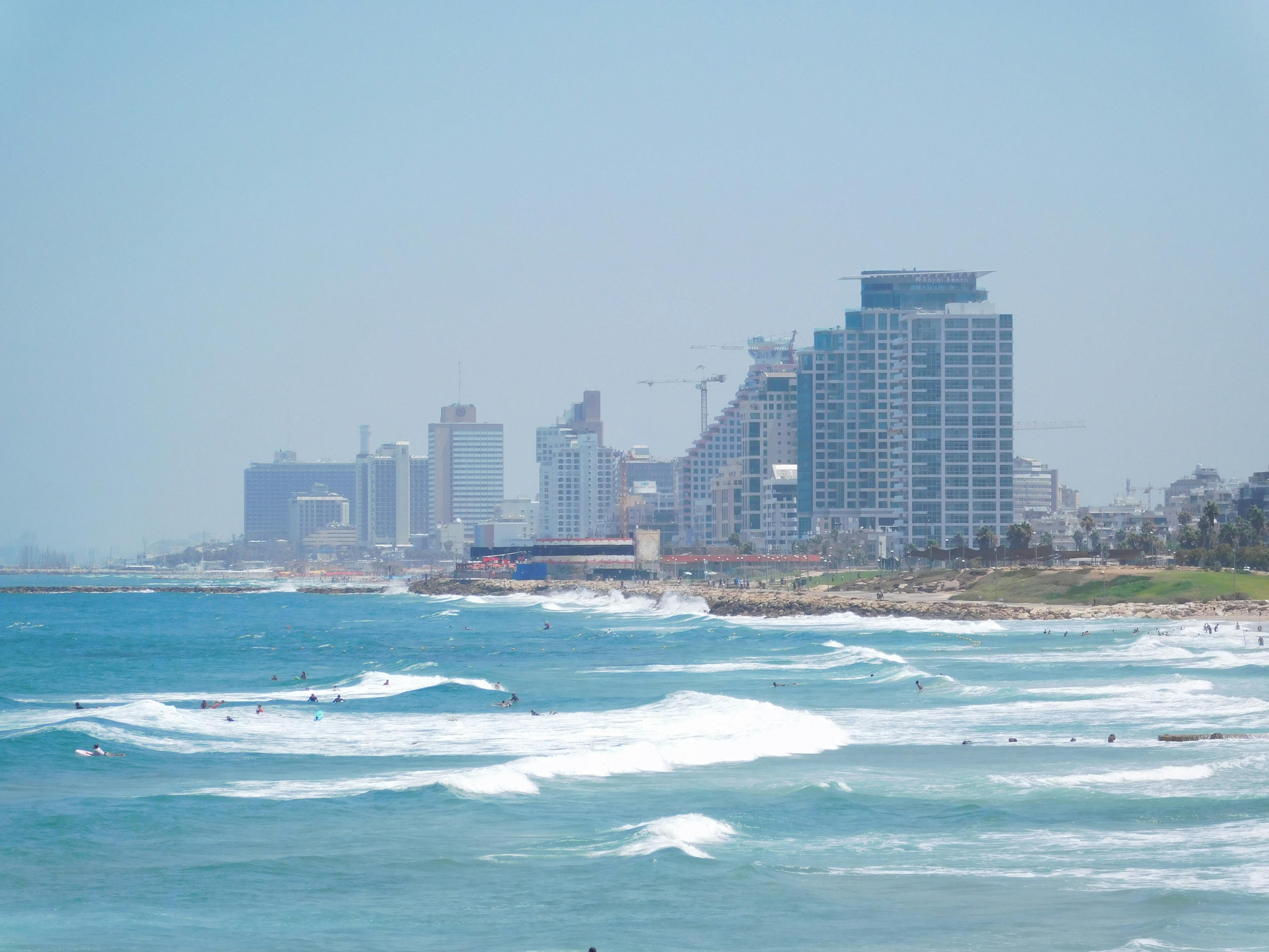City skyline meets the sea – surfboard rental in Israel