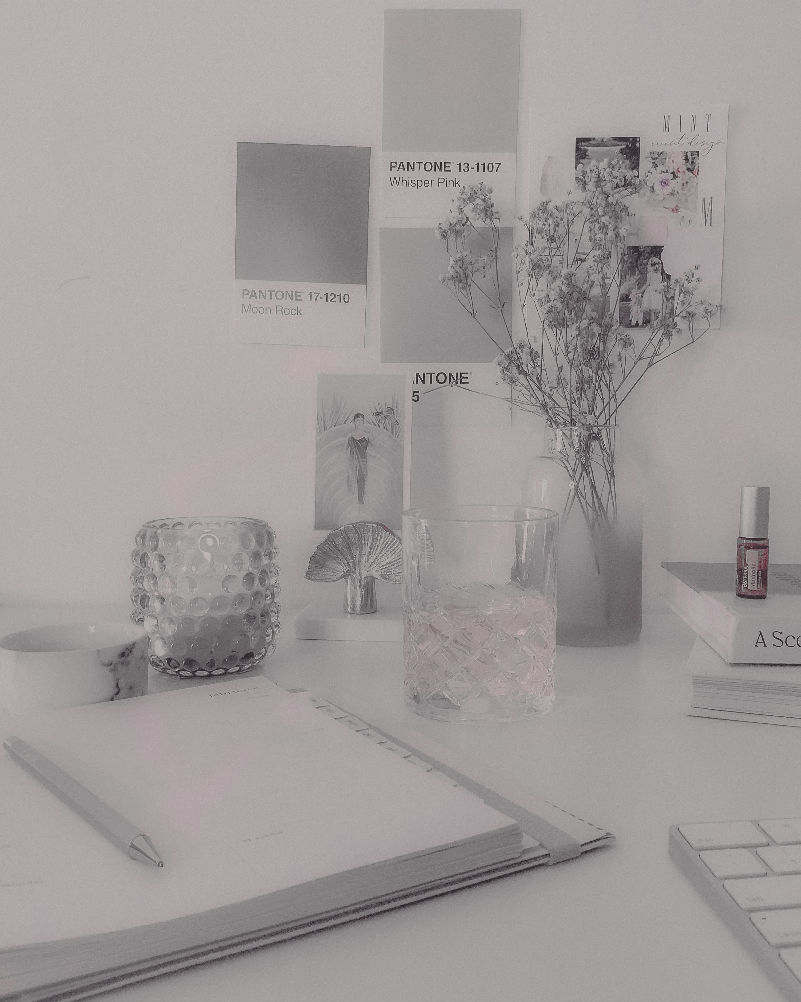 Interior scene with Pantone color card and dried flowers in a vase