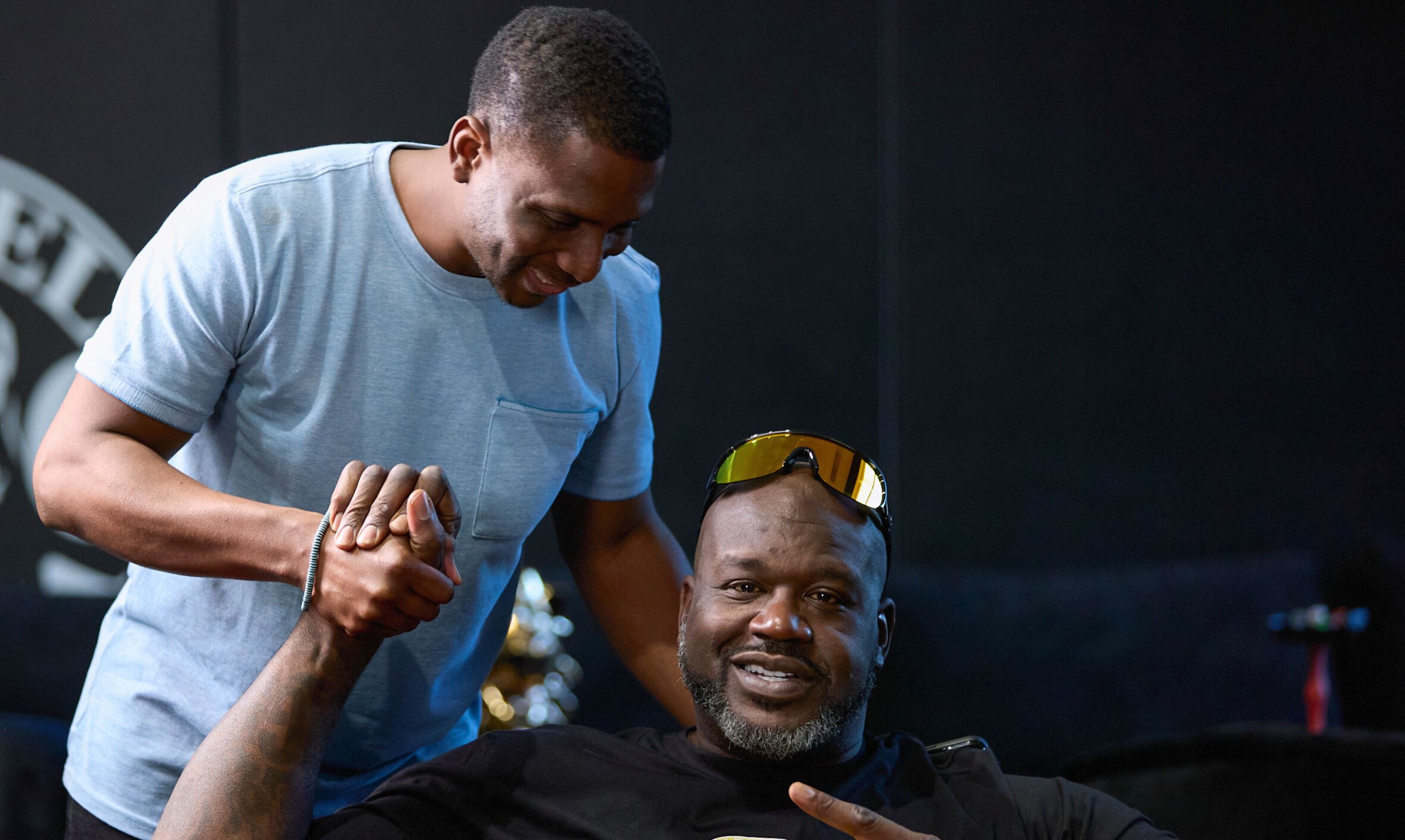 Antoine Adams with Shaquille O'Neal on set of the Big Podcast