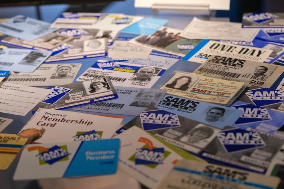 Collection of sam's club membership cards and ids