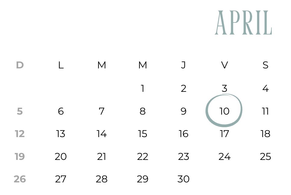 A couple in formal wedding attire embraces intimately in a vast.