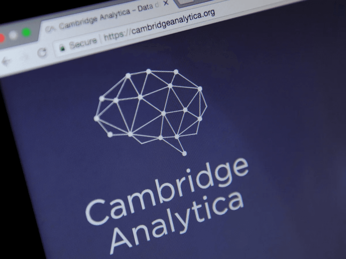 Computer screen showing Cambridge Analytica logo.