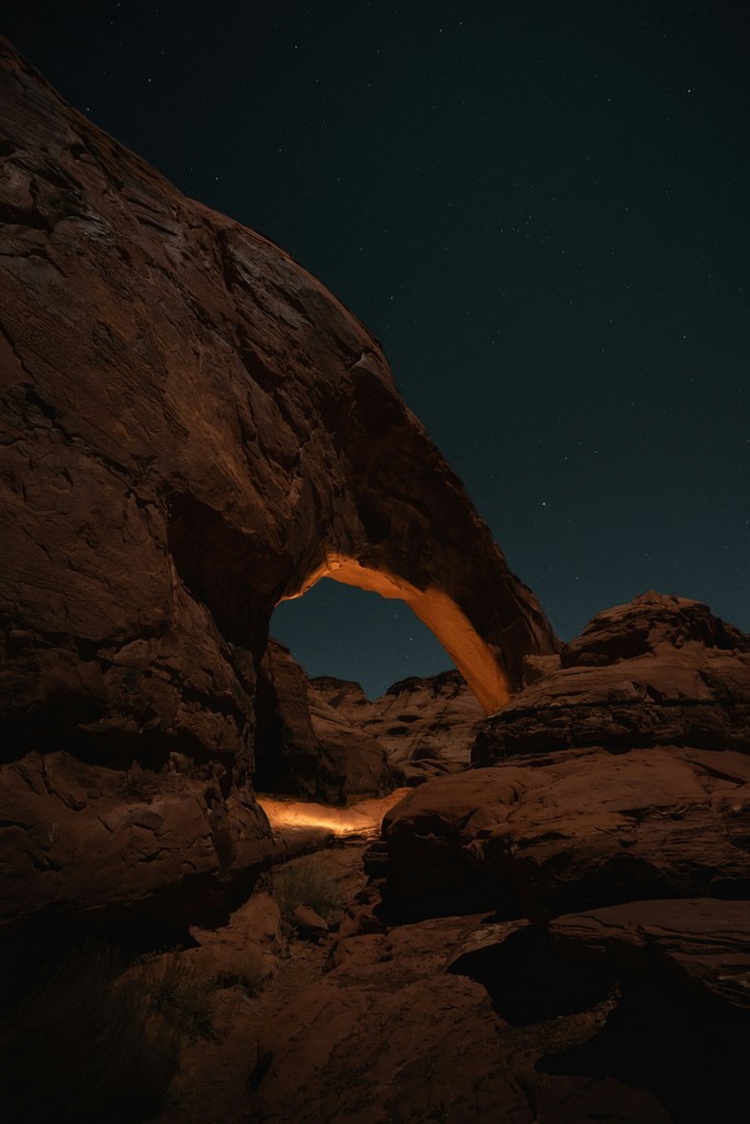 Arch rock formation at night