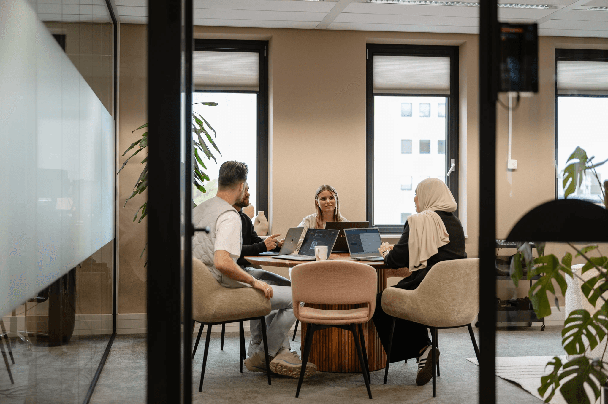 two women sitting on chair