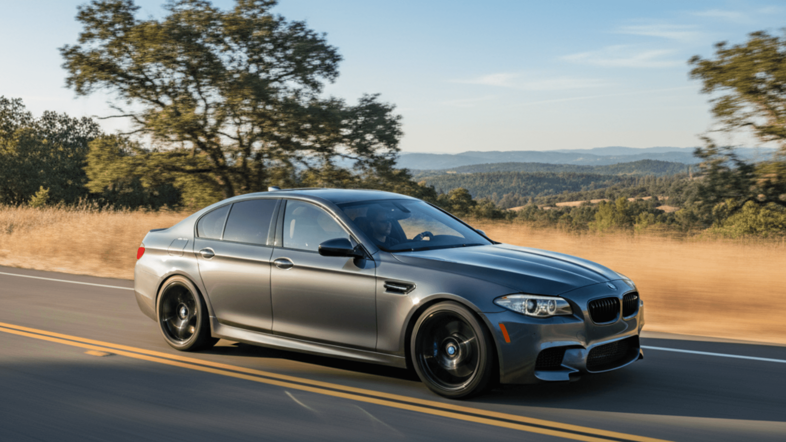 2015 BMW M5, a high-performance sports sedan from the F10 generation. 