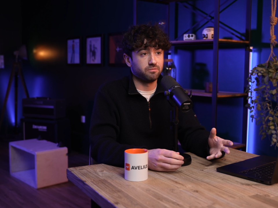 Woman in pink patterned shirt.