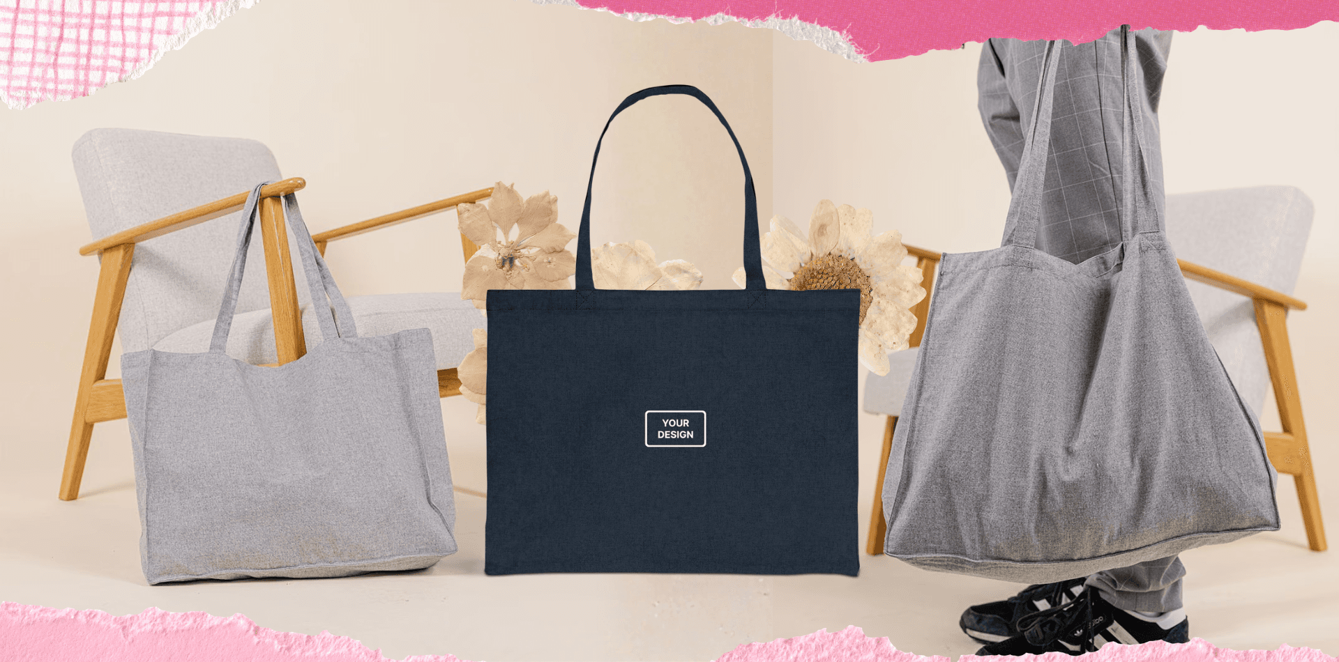 Large grey and navy tote bags with custom logo placement shown in a modern lifestyle setting.