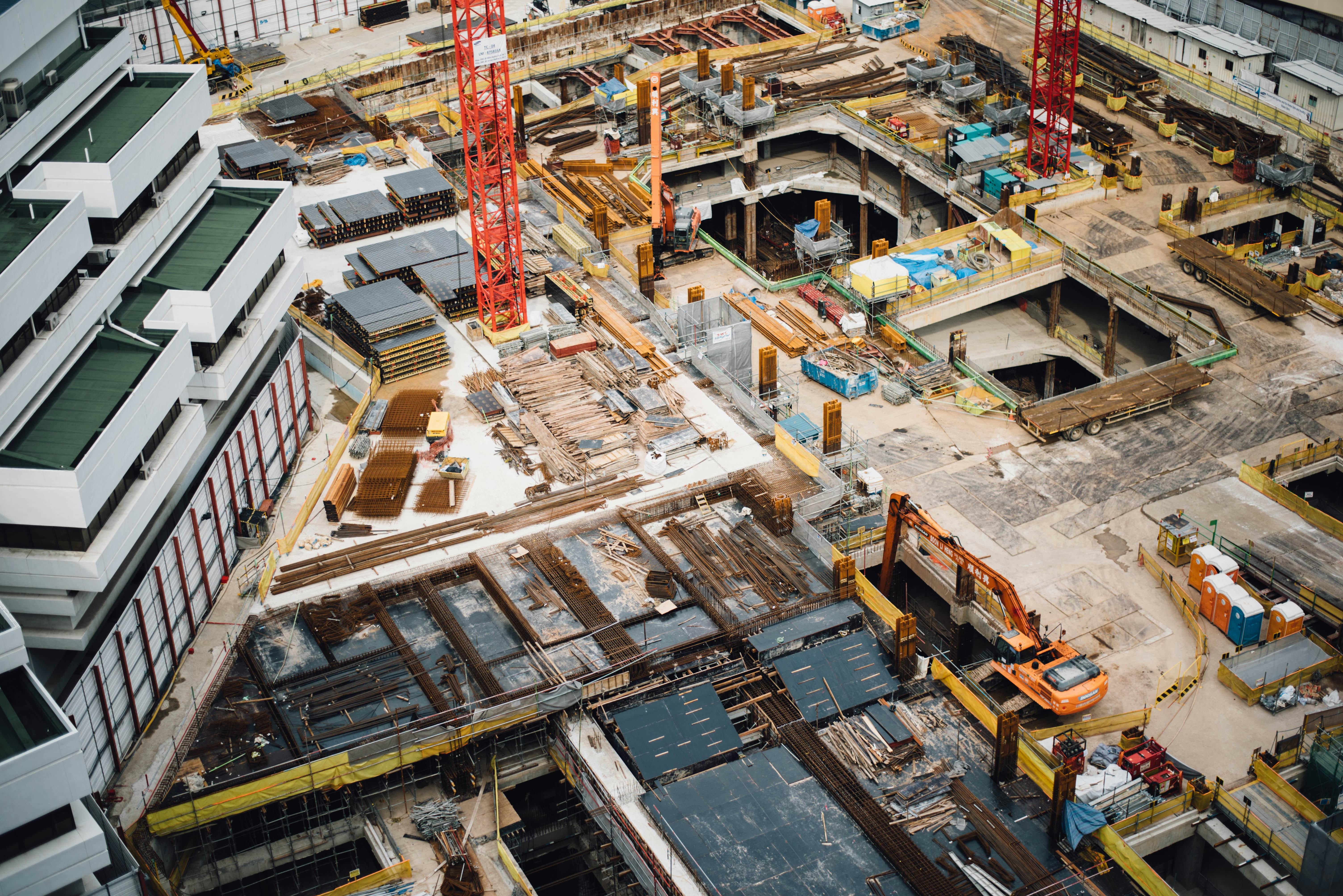 Construction site with cranes and building equipment