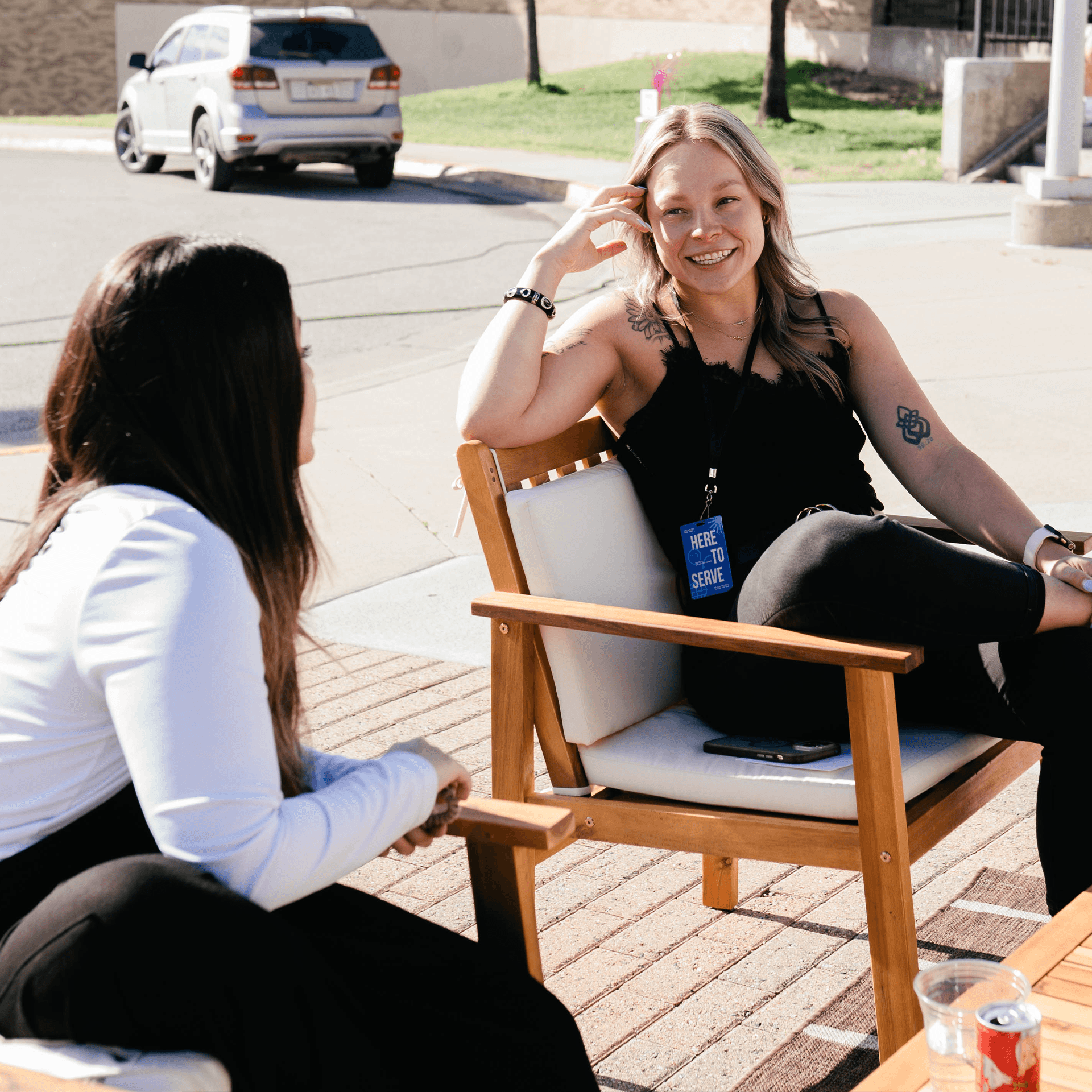 Two friends having a conversation.