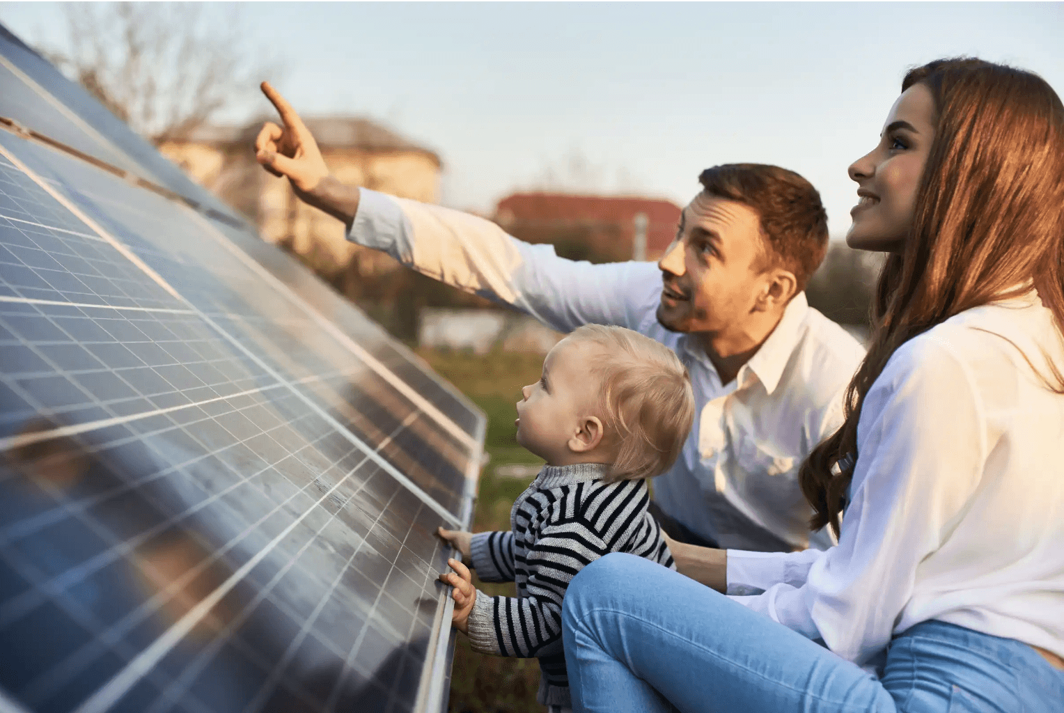 Family admiring solar panels