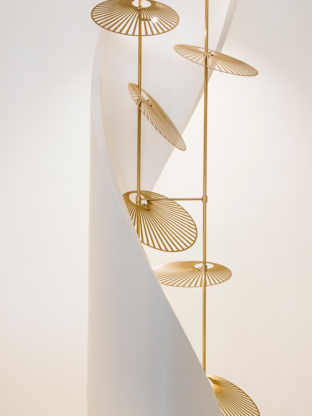 Leaf lighting installation at TTF Haute Jewellery – aluminium discs with dappled light effect