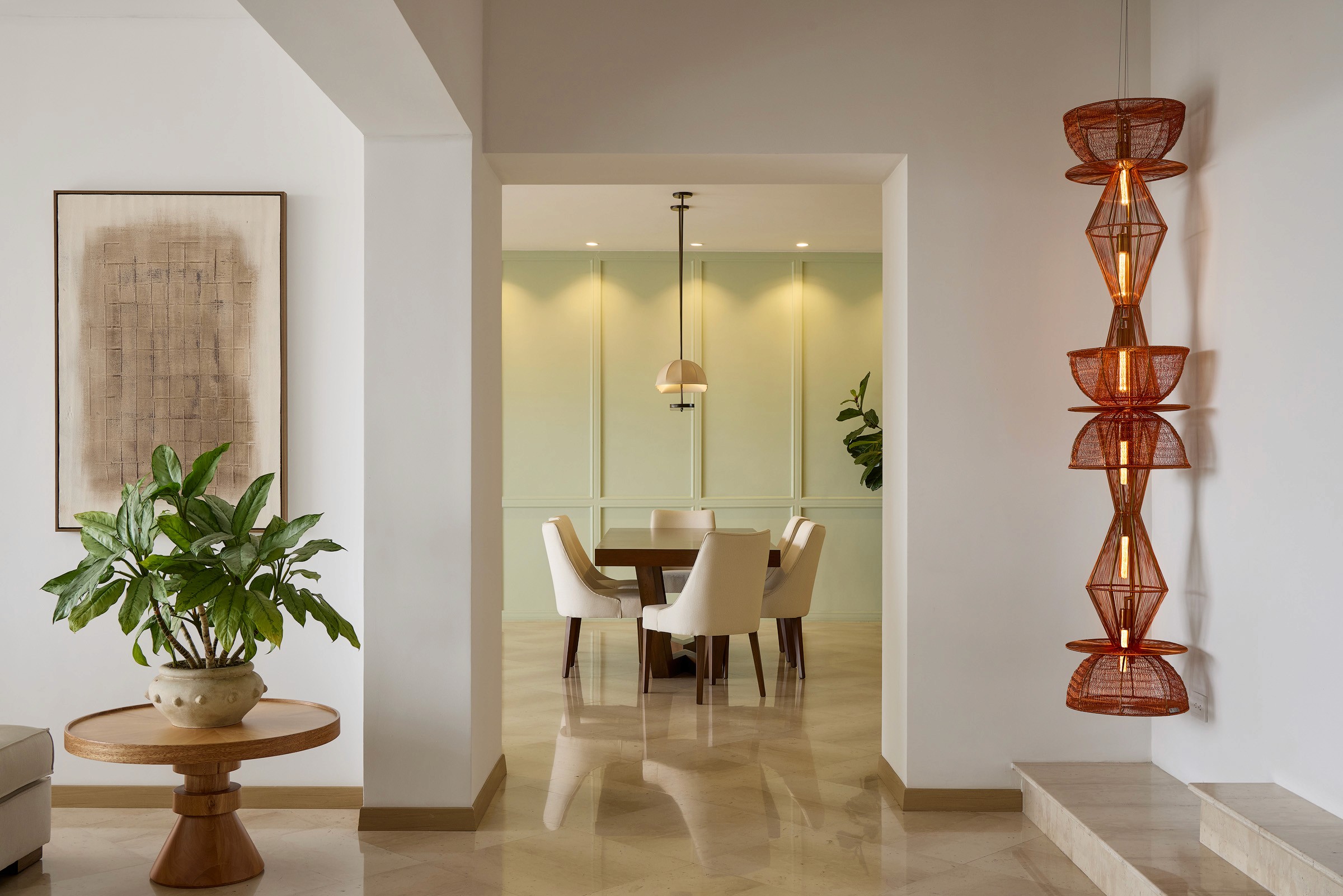 Modern living room with curved sofa and large windows