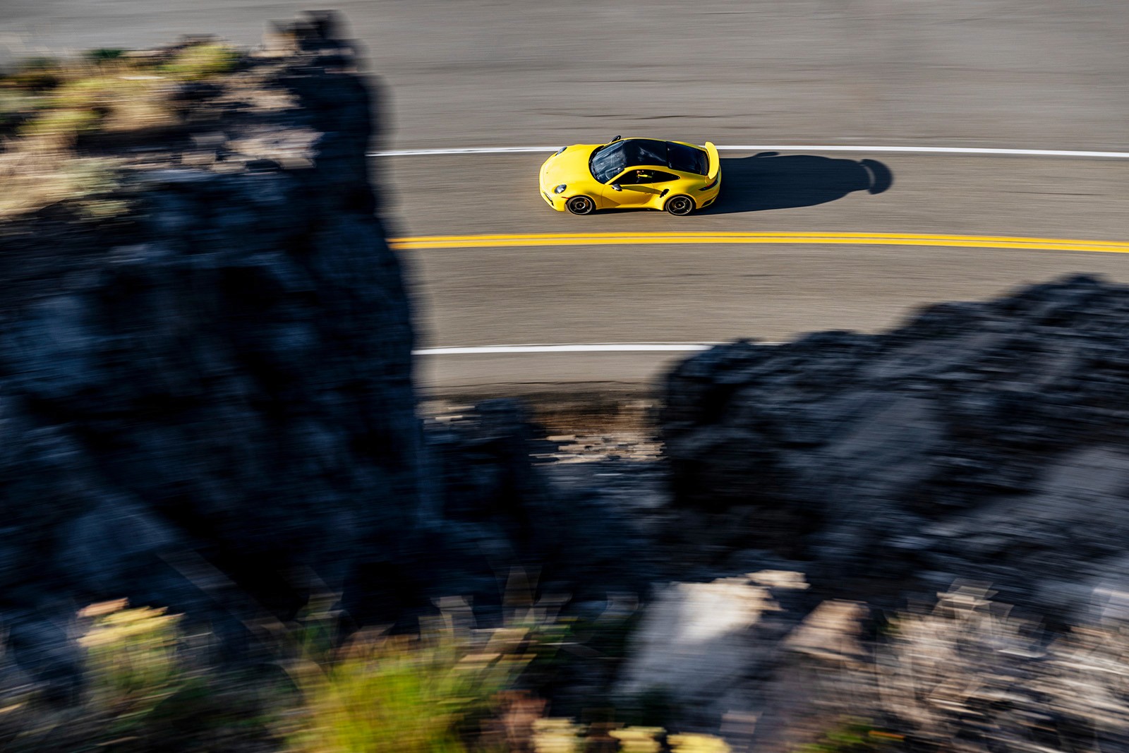 driving Porsche in the mountains