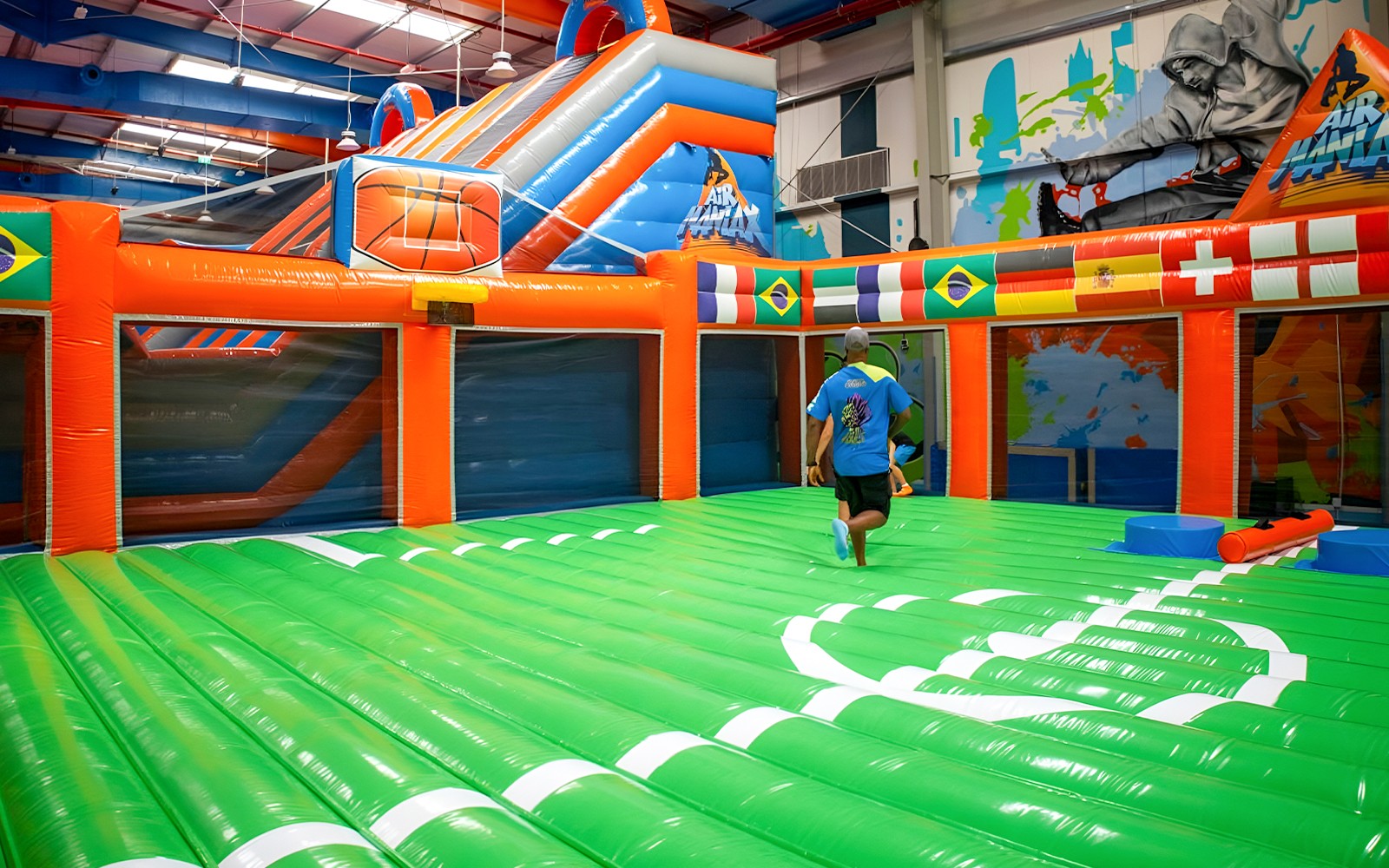 Children enjoying at Air Maniax Indoor Adventure Inflatable Park in Dubai, a unique family-friendly attraction offering fun-filled activities
