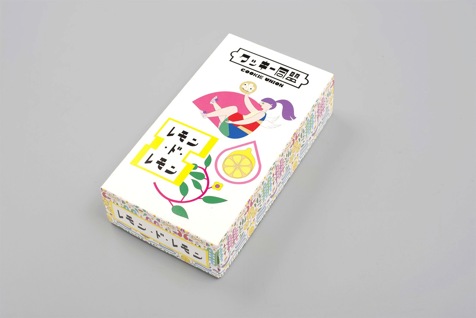 Cookie Union packaging box featuring bright cartoon-inspired illustrations and graphic patterns. Lemon flavor