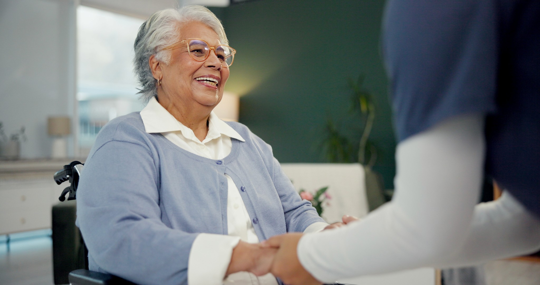 friendly female pediatrician touches shoulder teenage