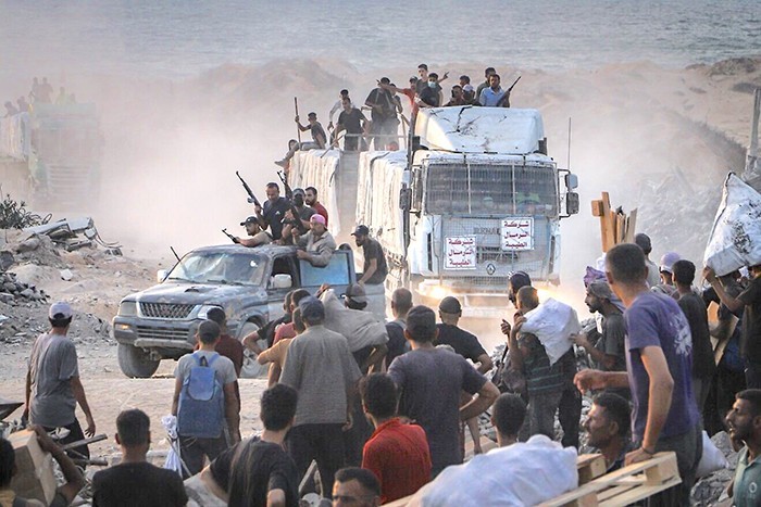 Armed Palestinians On Humanitarian Aid Truck In Gaza