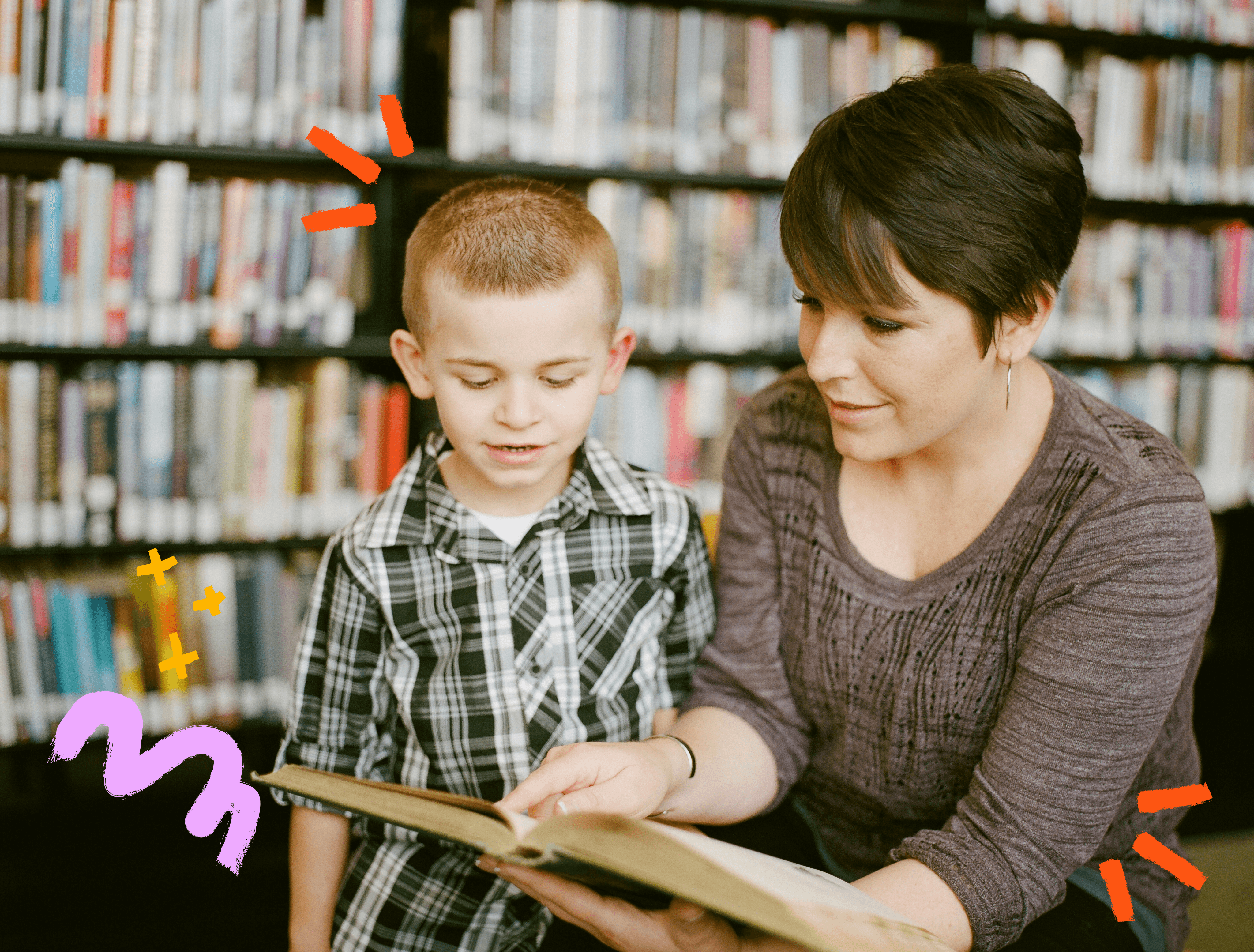 Image of teacher reading to a student in a library with some paintstroke decals