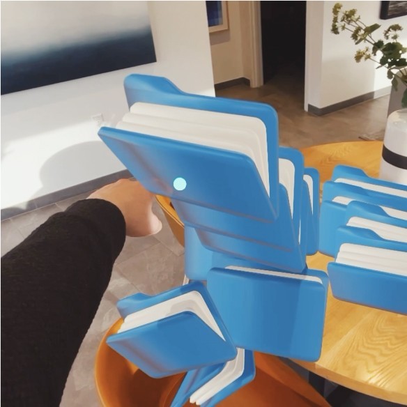 Photo of blue virtual folders scattered across a table