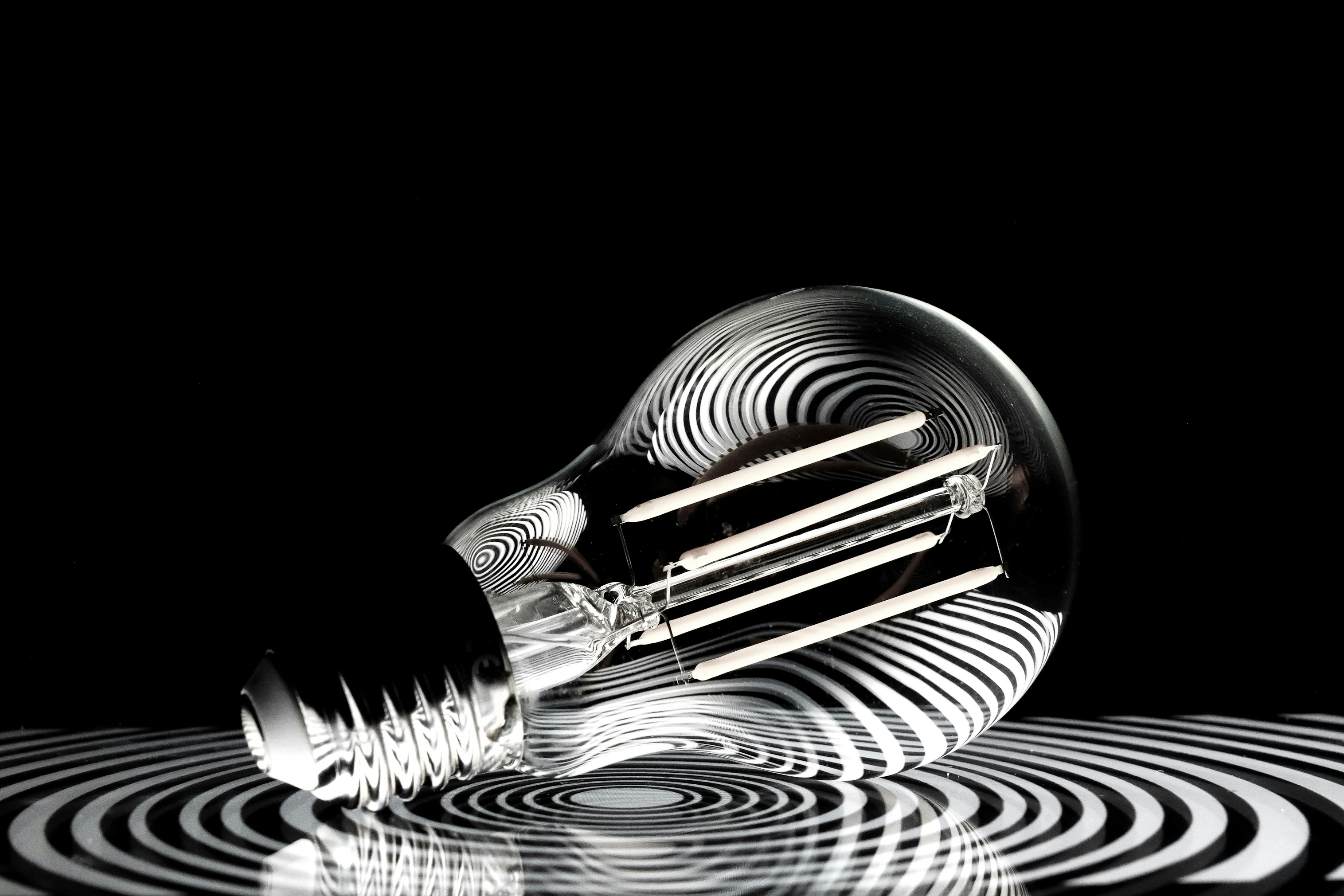 a black and white photo of a light bulb