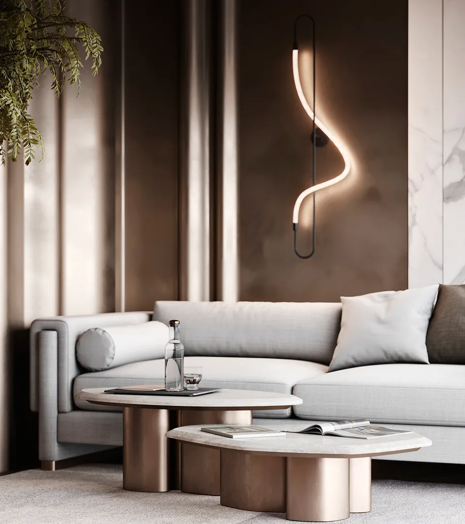 City Studio Zurich office lounge detail with sculptural wall light, neutral sofa, and round coffee tables
