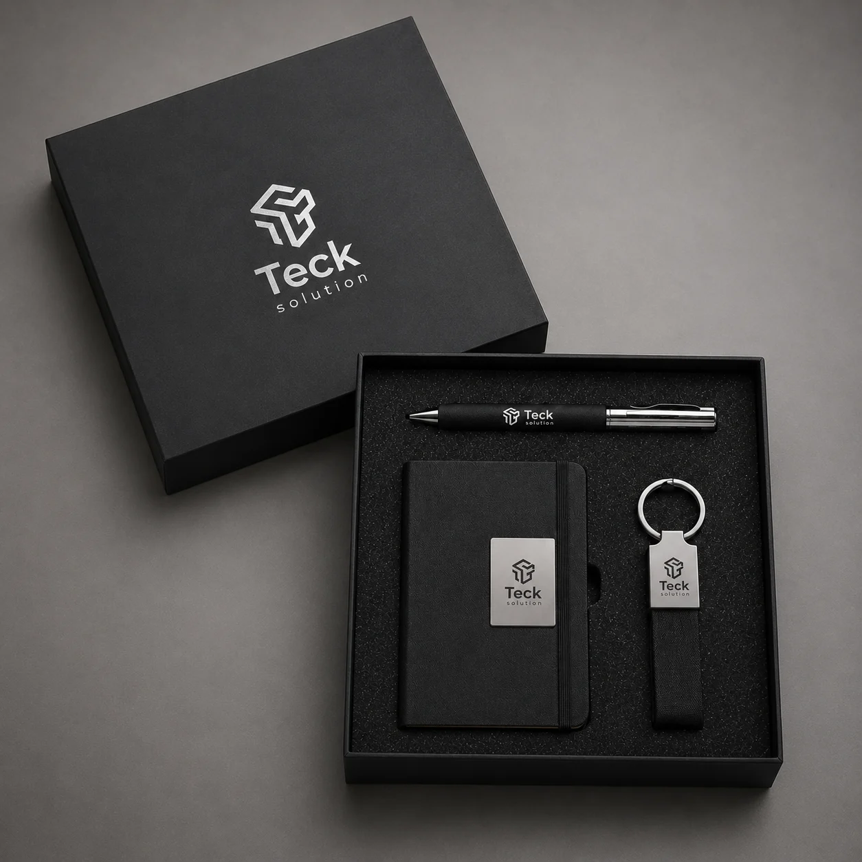 Pack ejecutivo personalizado con libreta, bolígrafo y llavero corporativo premium