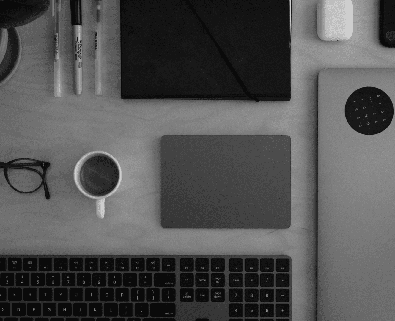 Desk with keyboard and brown chair