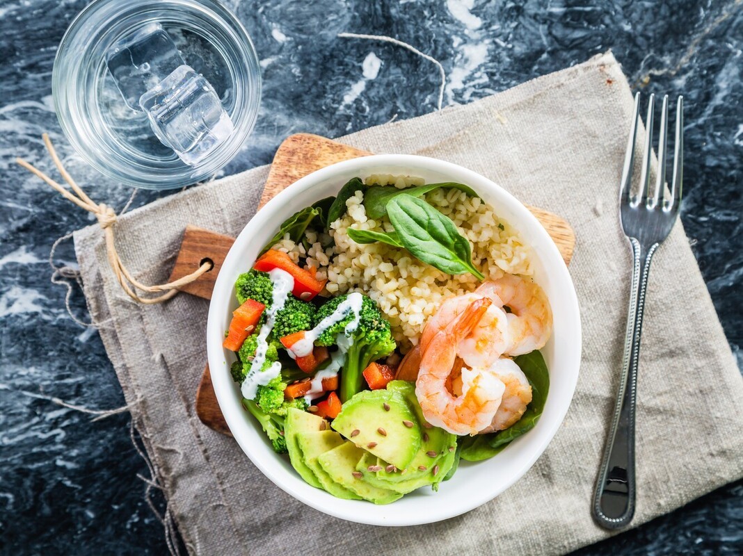 woman getting a good night’s rest in bed to recover from stair climbing for weight loss