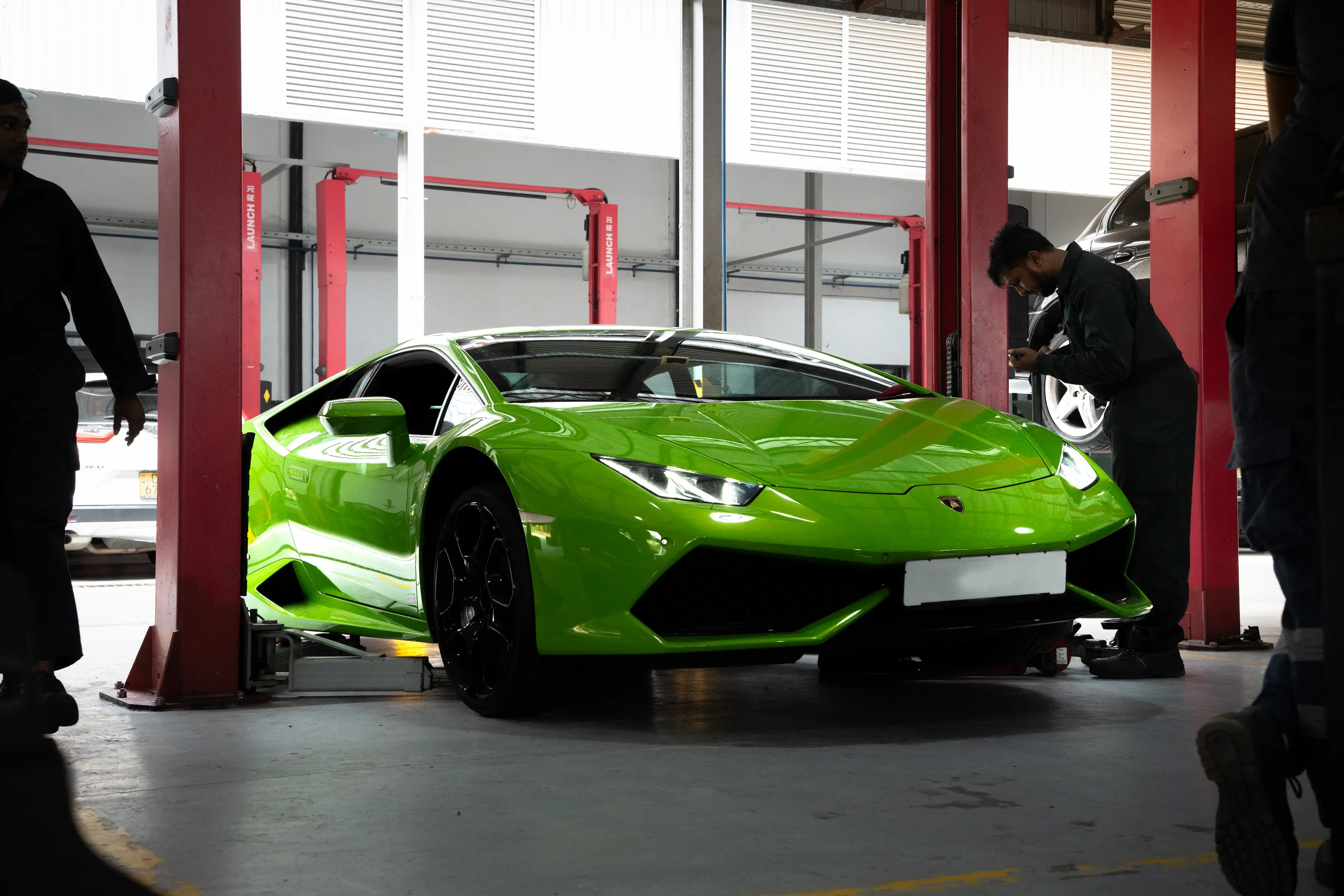 Expert working on premium car
