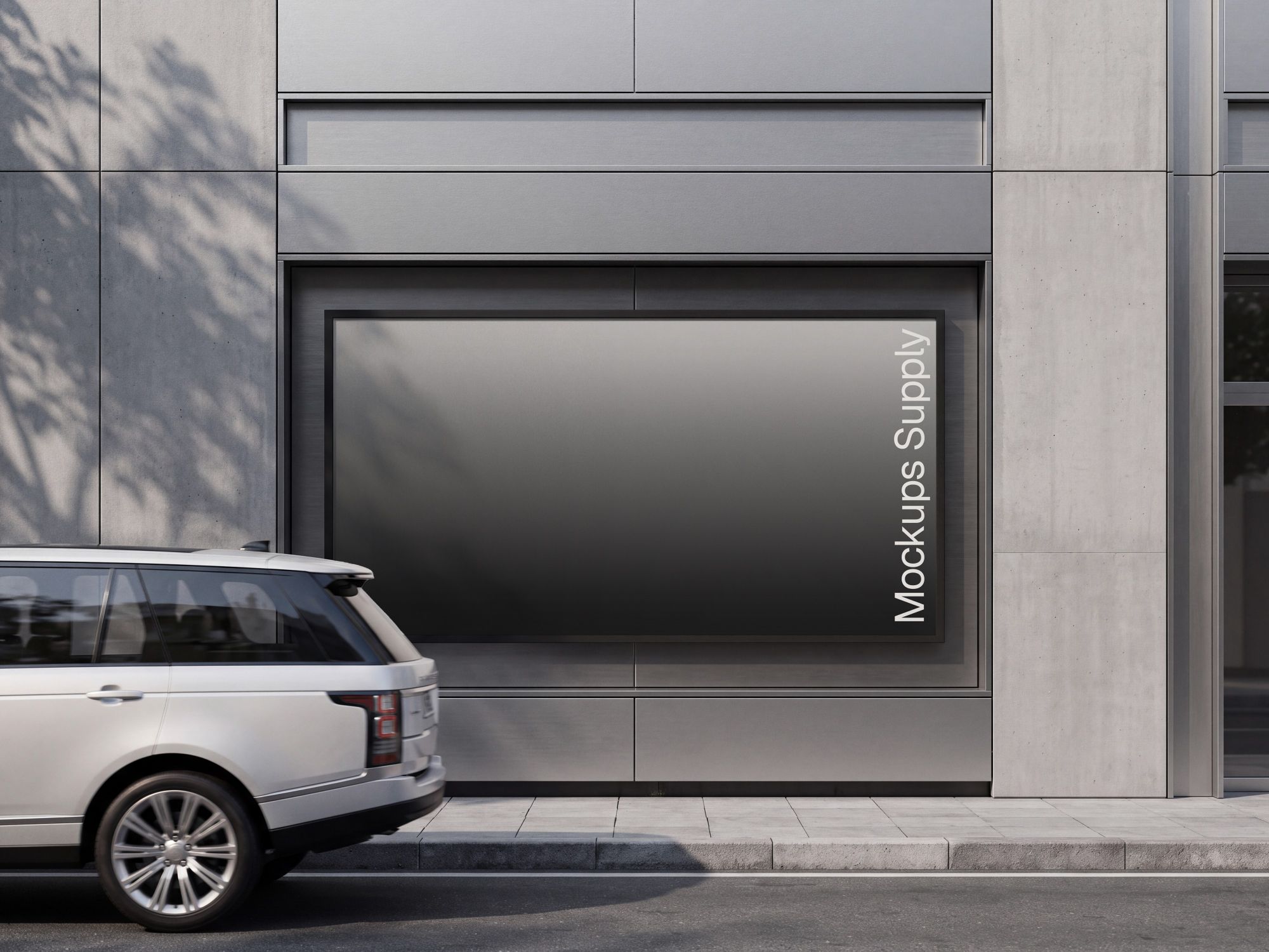 Landscape billboard mockup on a grey stone facade with tree shadows and a silver SUV on the street
