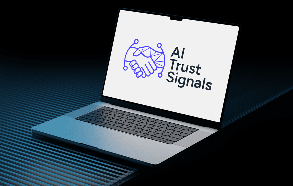 AI Trust Signals logo on a laptop screen, depicting a handshake formed by digital lines.