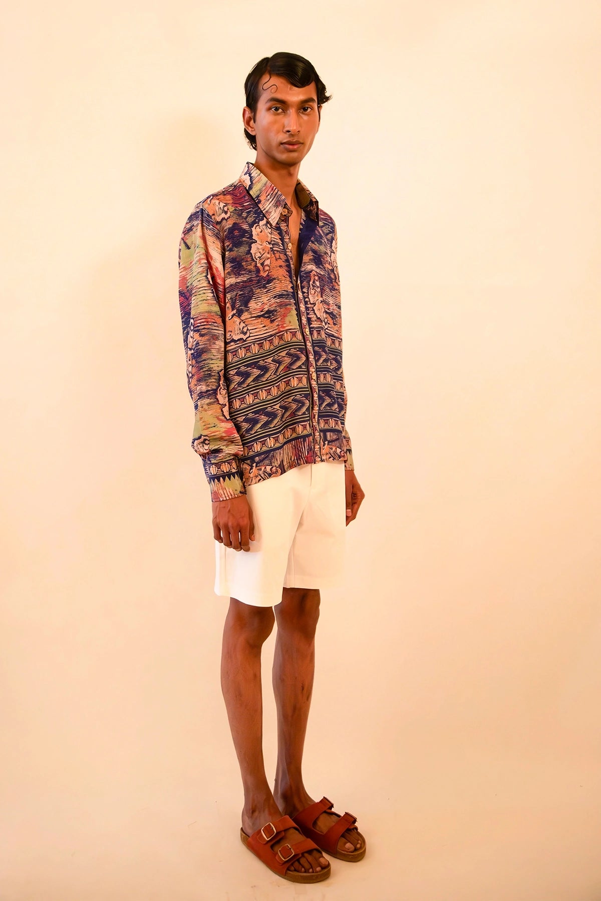 LAVYA is a one-of-a-kind full-sleeve shirt, crafted from vintage fabric in a bold multicolour butterfly print.