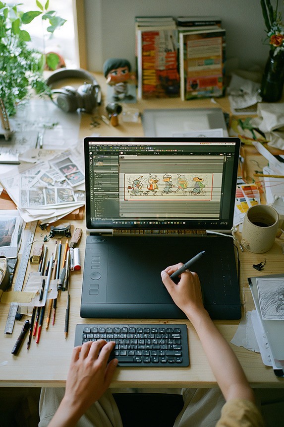 Animator working on a digital comic