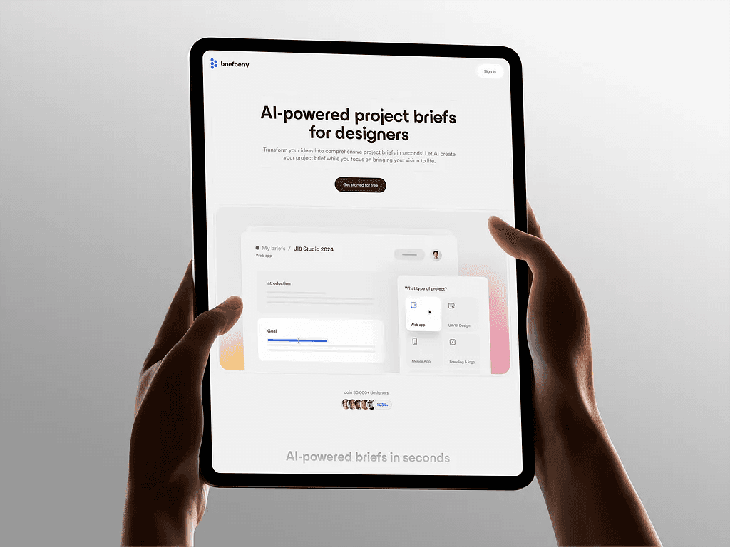 Creative workspace with large windows and a wall full of inspiration boards.
