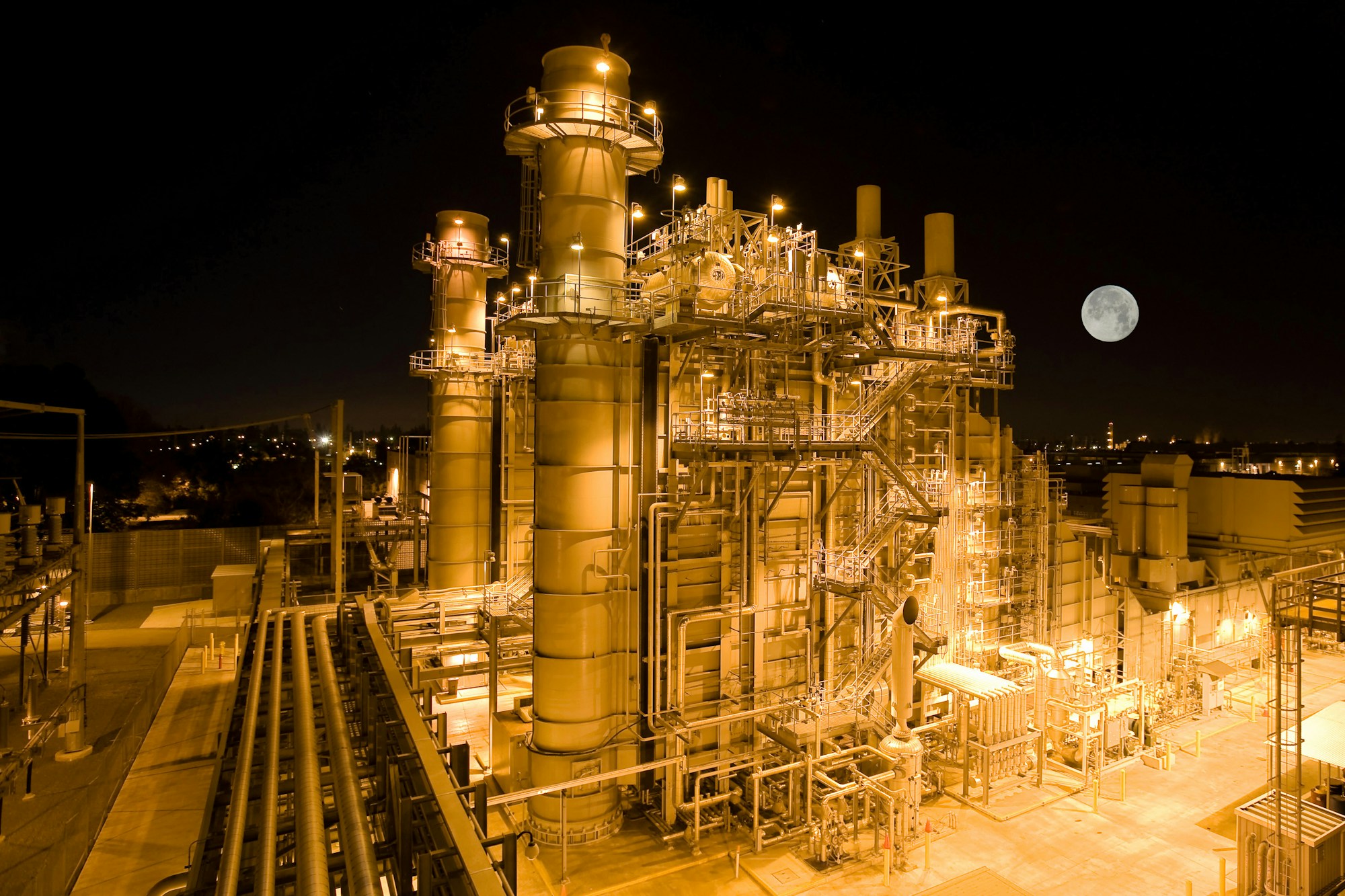 An industrial plant lit up at night