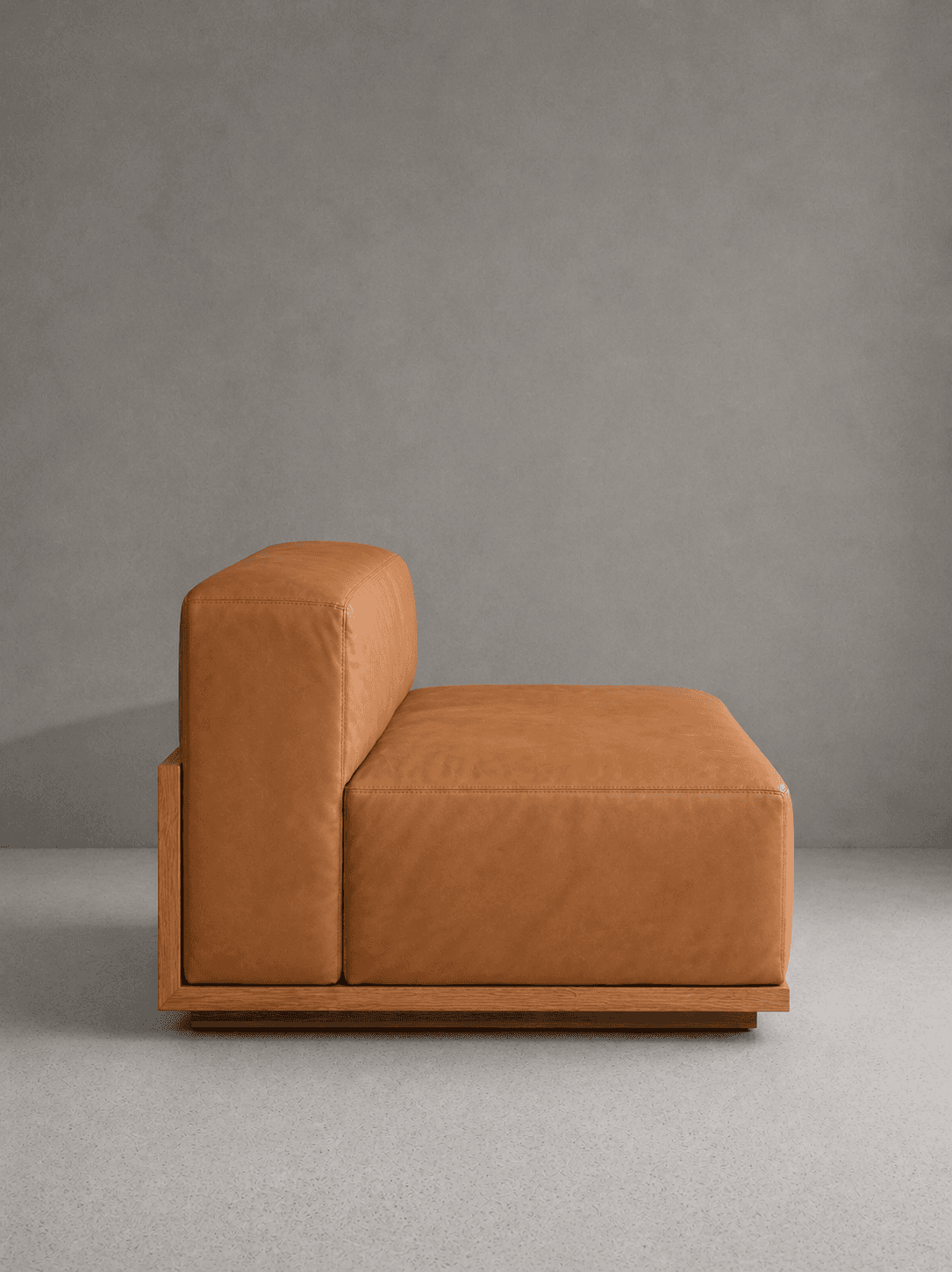Minimalist leather lounge in soft lighting