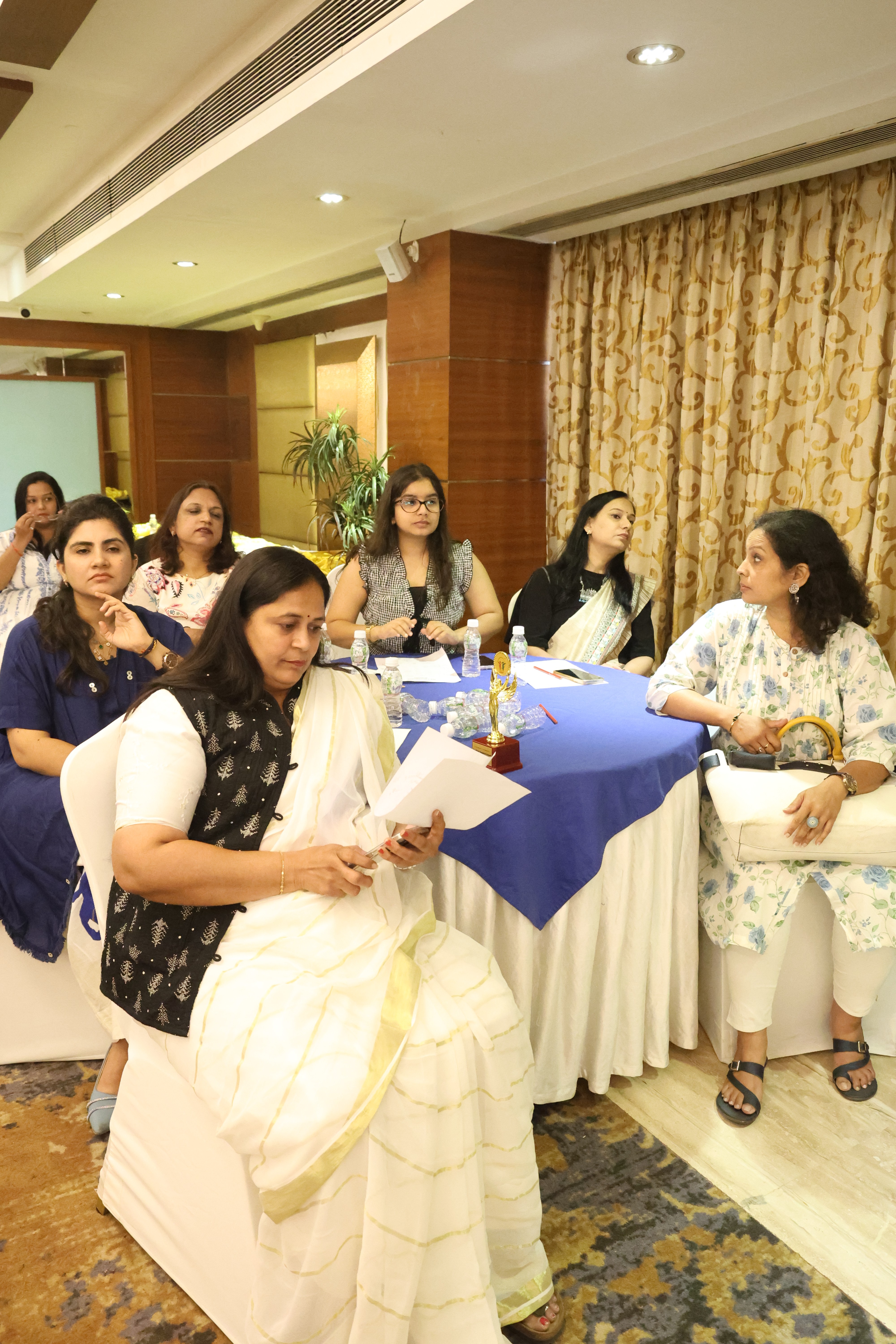 A Man Talking using Microphone in the Conference Room