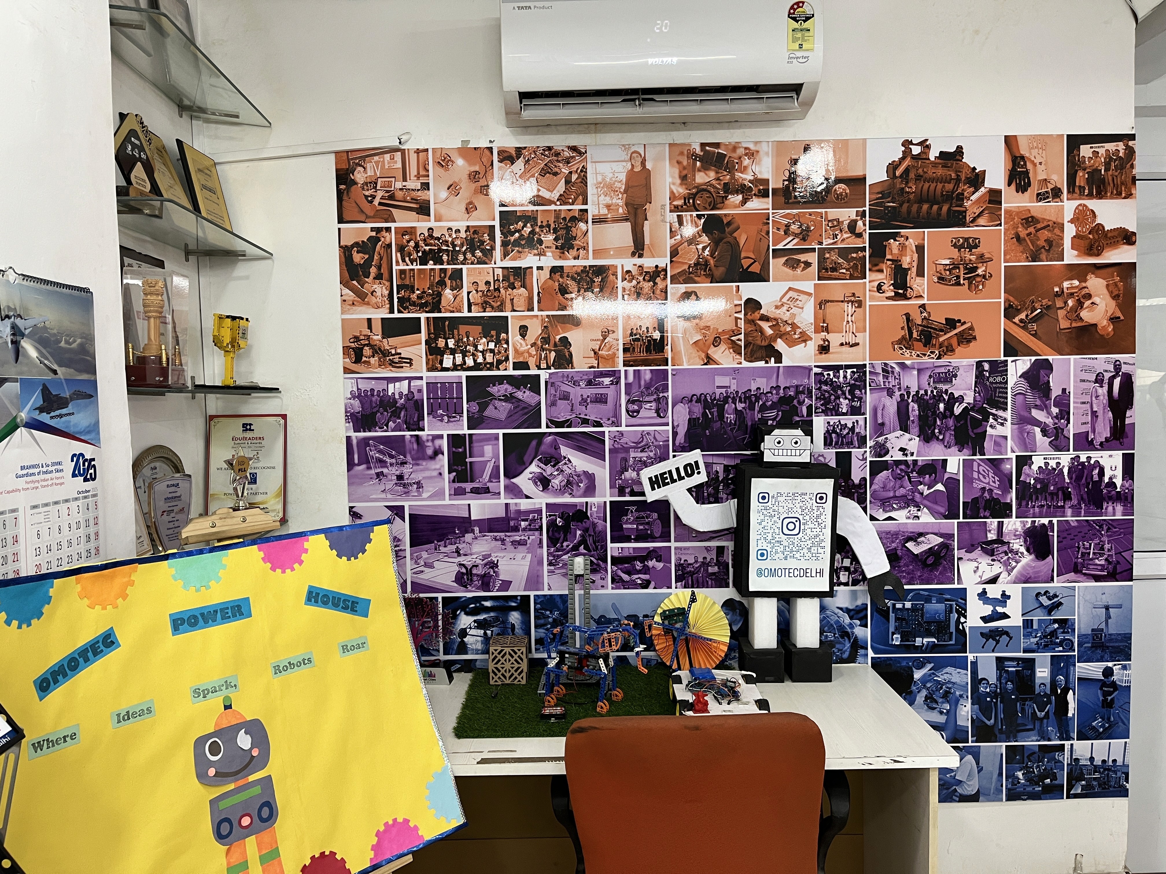 Palm trees frame a dramatic mountain valley landscape